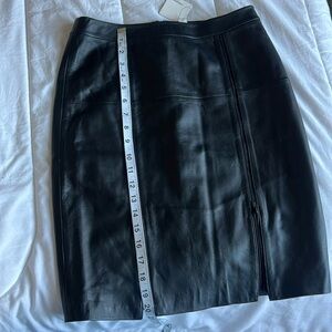 Leather skirt with 2 front zippers. Size 4 petite.